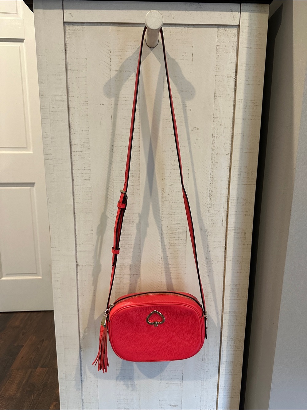 kate spade Coral-Red Pebbled Leather Crossbody with Tassel